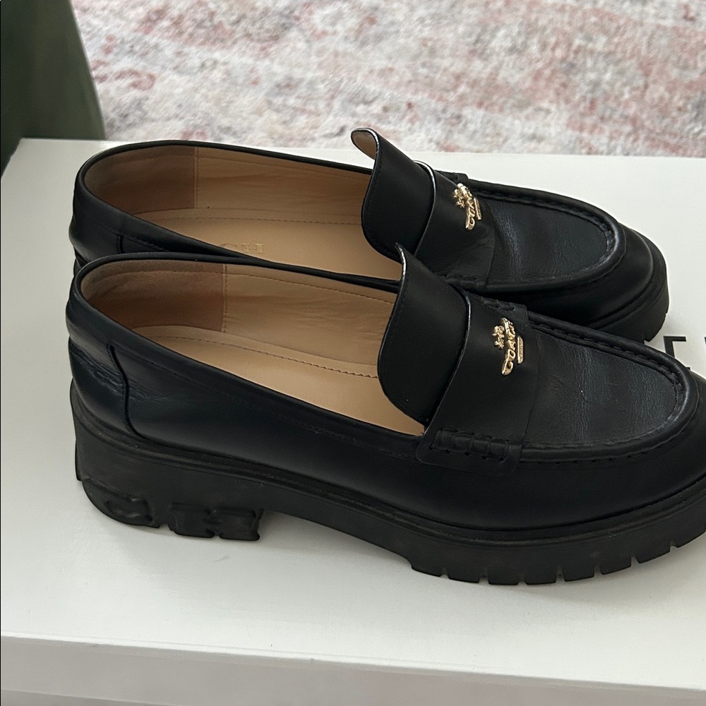 Coach women's Elegant Black Leather Loafers